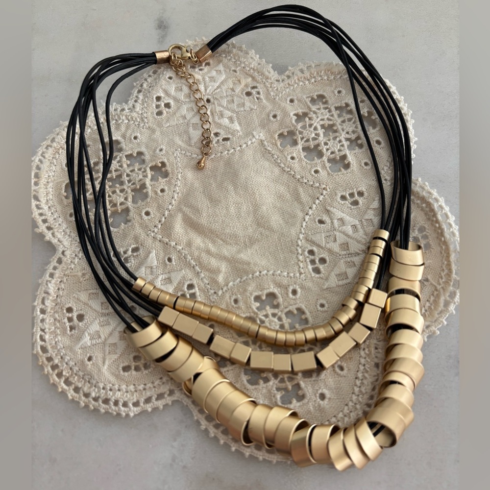 Elegant Gold and Black Necklace